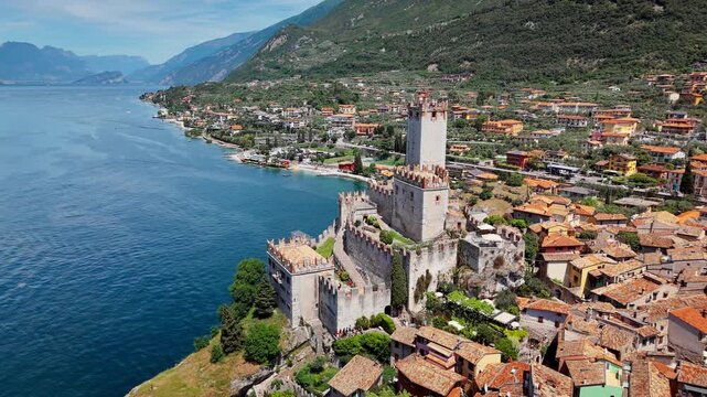 Scaliger Castle fortress in Malcesine on Lake Garda. Historic medieval architecture with tower, battlements and stone walls