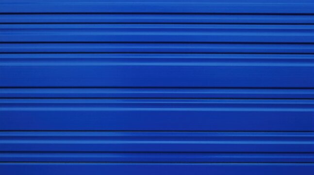 Abstract blue horizontal lines pattern on aluminum composite panel. Geometric texture with parallel grooves and ridges. Modern background for design and construction.