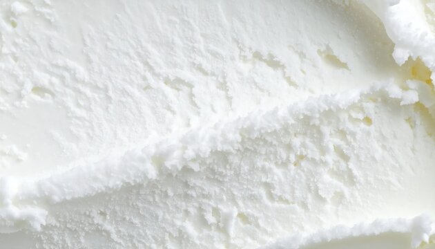 Macro texture of smooth white vanilla ice cream dessert.