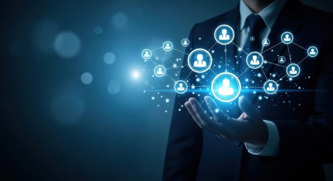 Business professional holding a glowing virtual human network, representing online communication, CRM, customer relationship management, HR technology and global connections