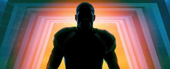 Fototapeta premium A lone athlete steps through a brightly lit stadium tunnel, surrounded by dynamic colors and an energized crowd.