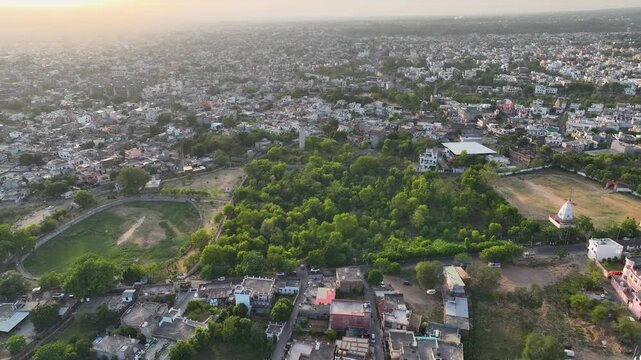 Aerial Orbiting Shot of Sustainable Urban City Infrastructure and Large Green Parks