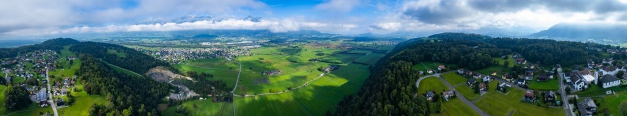 Naklejka premium Aerial view around the mountians in Liechtenstein beside Switzerland on a sunny day in summer.
