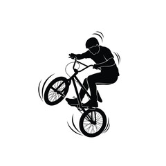 Naklejka premium Man performing trick on bmx bike in motion