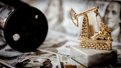 Golden oil pump stands atop marble base © I