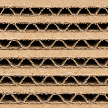 Corrugated cardboard edge texture with layered fluted paper structure