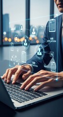 Fototapeta premium Business executive managing human resources data on laptop with digital interface holographic overlay