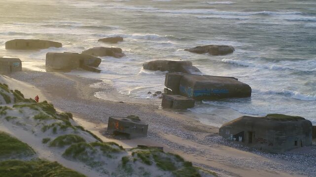 Drone panning over old World War 2 bunkers at the Danish West coast.