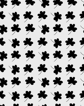 Minimalist seamless pattern with black clover