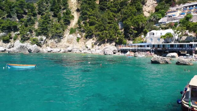 Spectacular drone footage of Marina Piccola bay and clear blue Capri sea