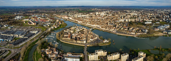 Aerial panorama view beside the old town around the city Chalon-sur-Saône in France on a sunny spring day. © Tony