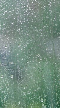Bokeh, window and raining with water, season and cold with environment, wet. Empty, glass and interior with dripping, h2o and grey clouds with texture, nature and street with splash