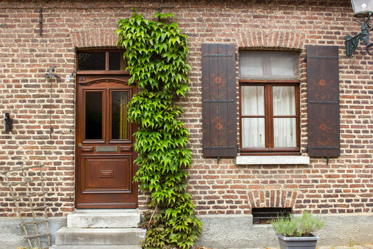 facade of old brick house in Arcen, the Netherlands