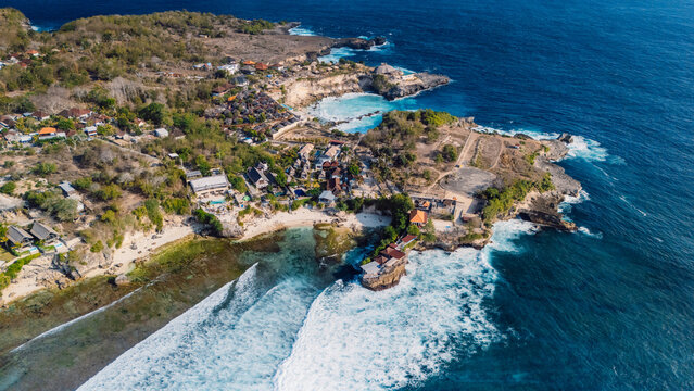 Above panorama of tropical peninsula with cliffs and turquoise ocean