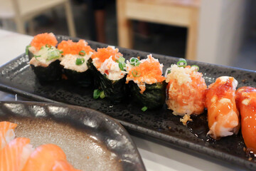 sushi and maki or Japanese roll , rice roll or seaweed rolls and salmon rolls © jobrestful
