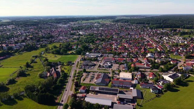 Panoramic drone shot of Krumbach, Germany. Stadtpanorama von Krumbach Schwaben. Drohnenflug. Luftbild der Wohnviertel und Strassen in Krumbach, Bayern. Aerial footage of the skyline Krumbach