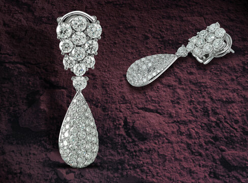 Ornate diamond earrings in white gold for a modern look.