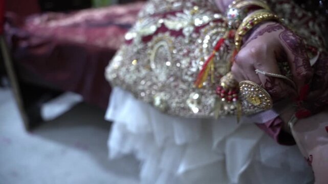 wedding rings on a wedding dress