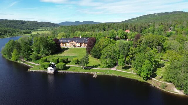 Panoramic drone view from Oslo, Norway. Arial view at Bogstad with farms and forest landscape.