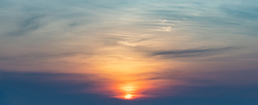 Beautiful vibrant twilight sky background with colorful soft pastel clouds for inspirational nature wallpaper panorama mockup