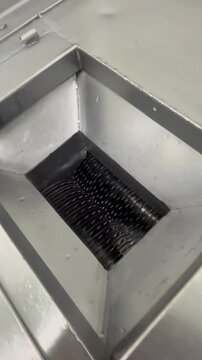 Damaged machine component in food manufacturing equipment highlighting the importance of preventive maintenance, equipment integrity, and food safety management systems.