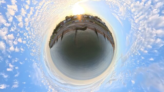 Little Planet Aerial View: Tiny World Stereographic Projection of Old Felixstowe Promenade and Beach Huts
