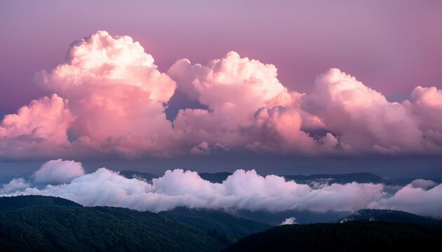 some clouds are over a pink sky