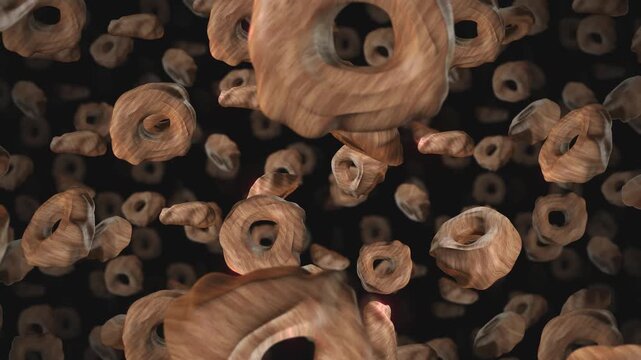 A background of spinning 3D carved wooden style shapes on an endless loop.
