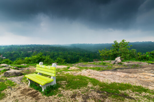 Empty bench on top of Mayur Pahar, "Peacock Hill", a hilltop viewpoint in the Ayodhya Hills range of Purulia district, West Bengal, India. Famous for its dense surrounding forests and wild peacocks.