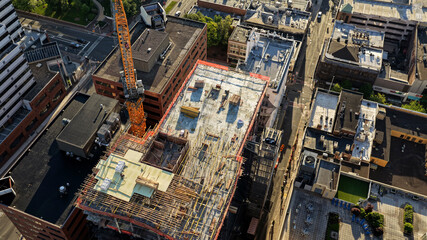 Fototapeta premium Aerial view of construction at the HELIX redevelopment project in downtown New Brunswick New Jersey