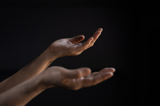 Dirty hand in begging gesture. Poverty and humanitarian crisis