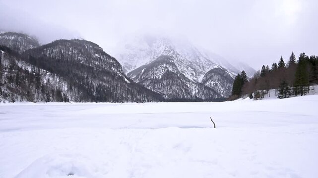 A winter of magic and mystery. Lake Predil in winter. Tarvisio.