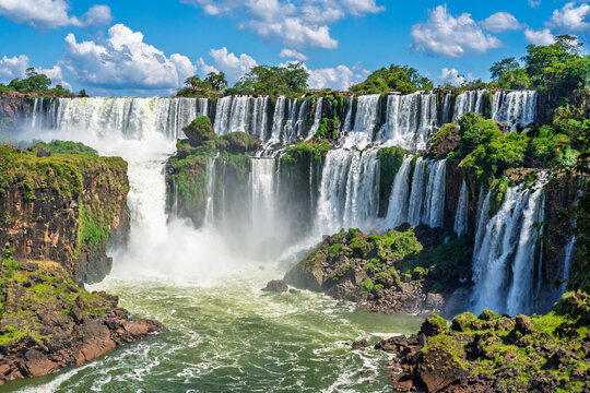 Panoramic view of the majestic Iguazu Falls in Iguazu National Park featuring powerful cascading water