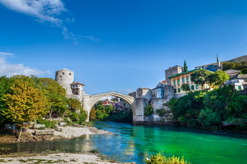 Naklejka premium Old Ottoman-era bridge over the Neretva River in the city of Mostar, Bosnia and Herzegovina
