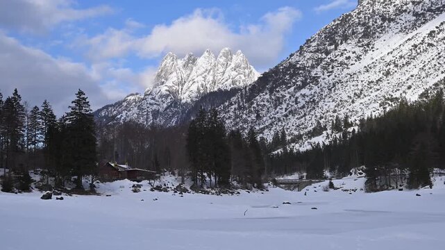 A winter of magic and mystery. Lake Predil in winter. Tarvisio.