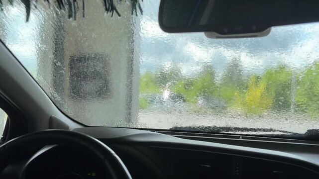 Automatic car wash point of view from inside vehicle
