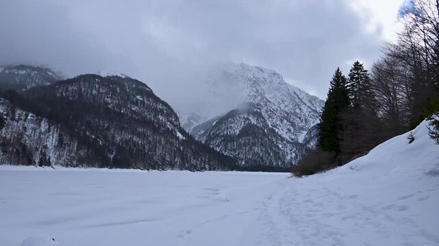 A winter of magic and mystery. Lake Predil in winter. Tarvisio.
