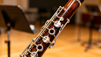 Fototapeta premium bassoon. A dark wood bassoon with silver keys, showcasing its elegant curves in a close-up view. tutorial guides, club newsletters, designed for sports & leisure club marketing.