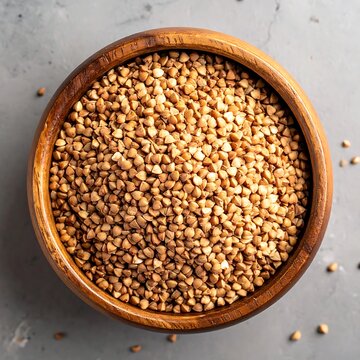 Wooden bowl of groats