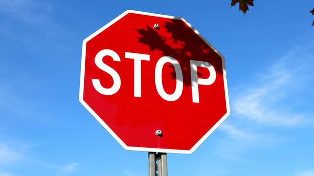Red octagonal parking sign, red STOP parking sign