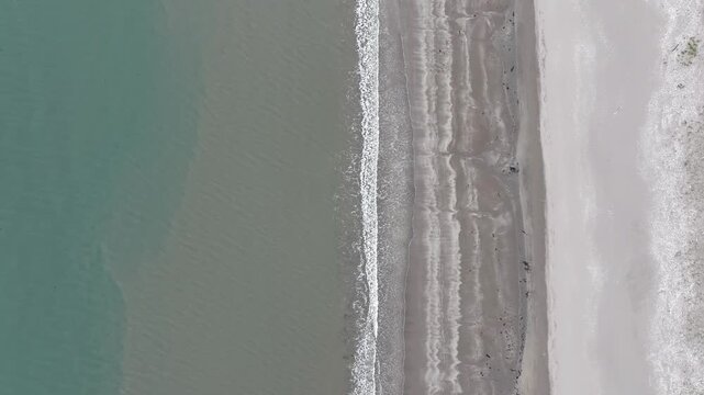 Aerial View of Sandy Beach and Ocean Waves at Nagahama, Ishinomaki, Miyagi, Japan