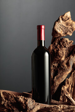Unopened bottle of red wine and old dried snags.