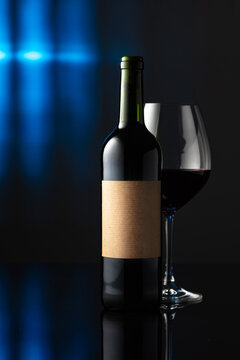 Bottle of red wine with old empty label.