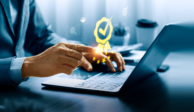 Quality certification concept with digital award badge on laptop showing quality assurance audit checklist approval control and corporate standard performance management system