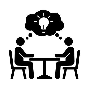 Black silhouette of two people sitting at a table with a thought bubble and lightbulb icon inside representing collaboration brainstorming idea generation and creative business team meeting concepts.