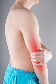 Diseases of the elbow joint, bone fracture and inflammation, man suffering from pain in cubit