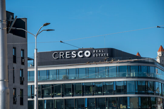 Bratislava, Slovakia - April, 27, 2026 - Cresco Real Estate sign on the top of the modern building in Bratislava.Slovakia.