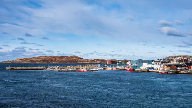 View to Vardo in Norway from the water with colorful buildings