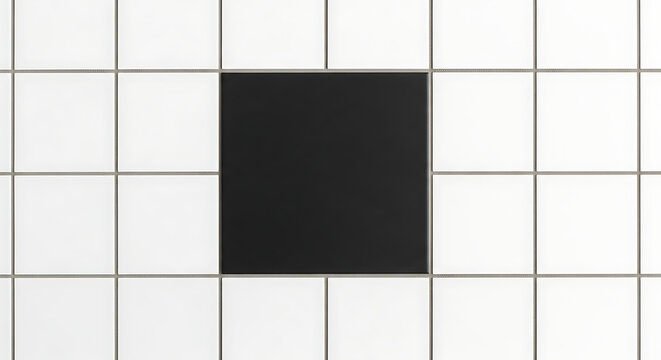 A black rectangular object is centered on a grid background.