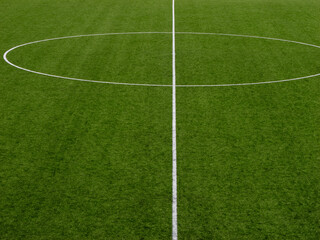 Center circle and halfway line on soccer field © Andrey